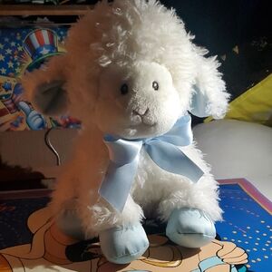 Cuddly White Lamb Plush Toy with Light Blue Details